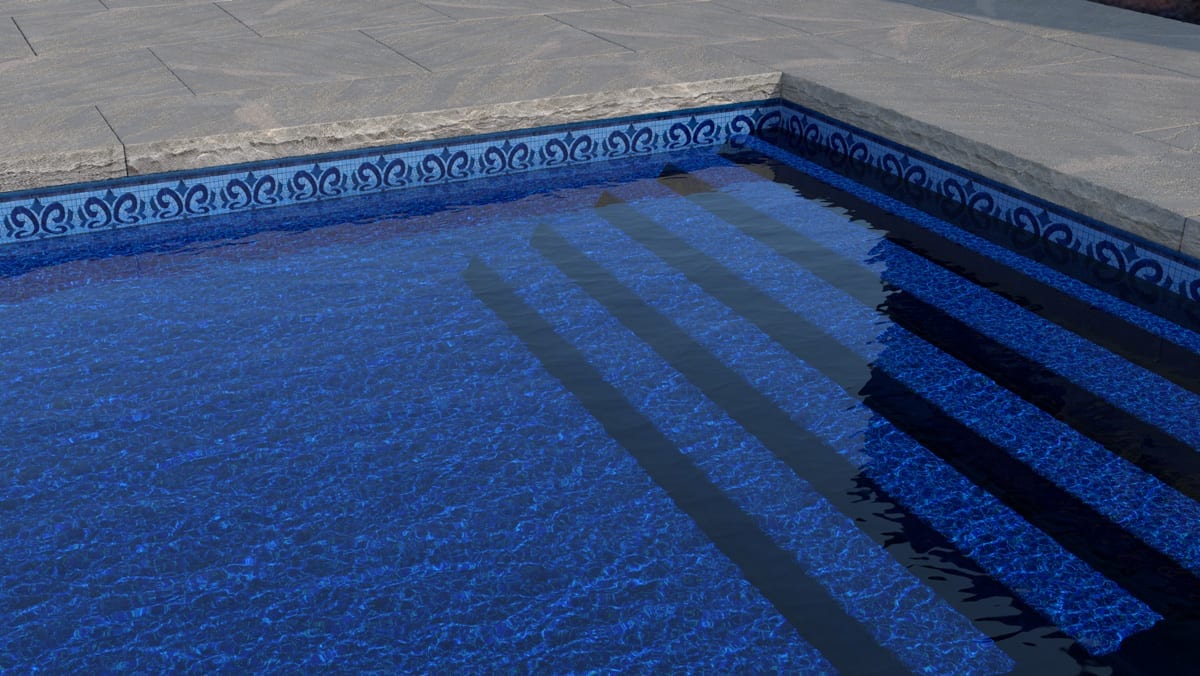 A swimming pool with clear blue water and decorative tile borders. The sunlight casts shadows on the stone steps leading into the pool.